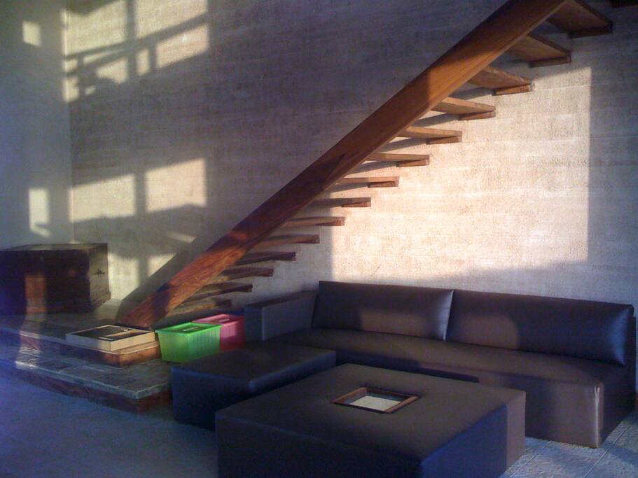 wooden stairs leading to the the first floor..