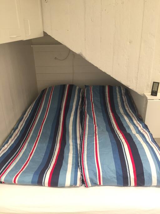 Full size bed. Two people sleep comfortable here.