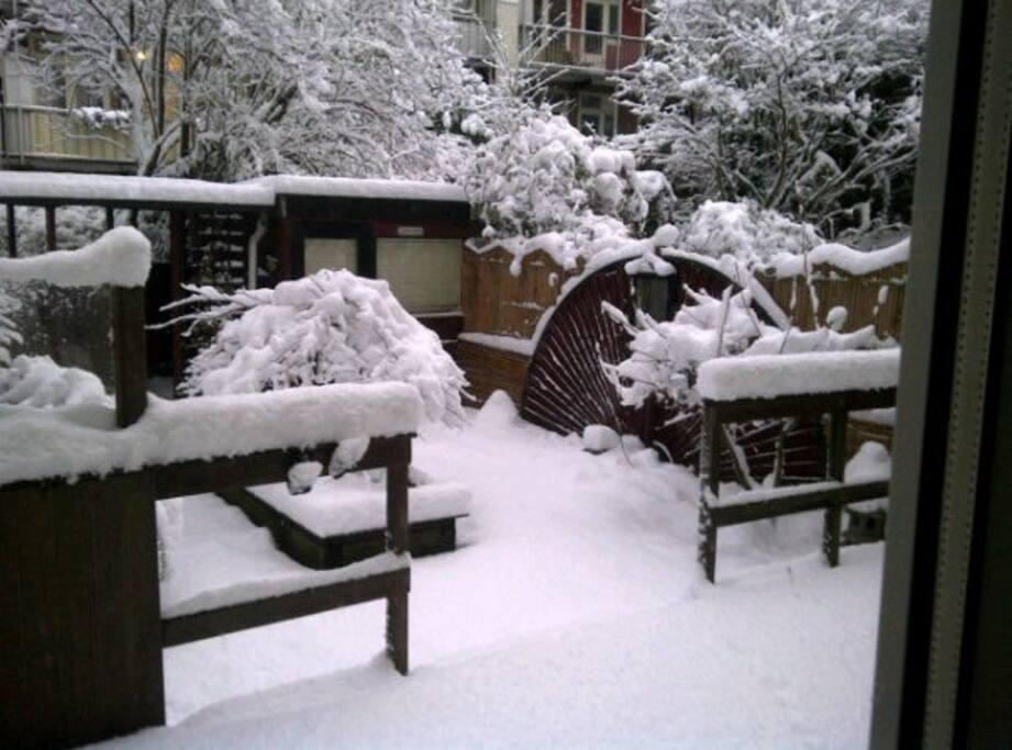 Large garden with outside seating and a Barbeque