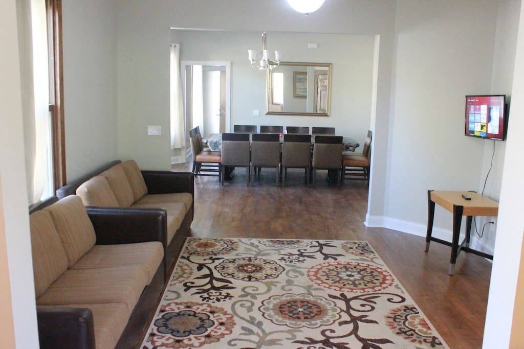 Living room with two pull out couches, lounge chairs, tv, wifi