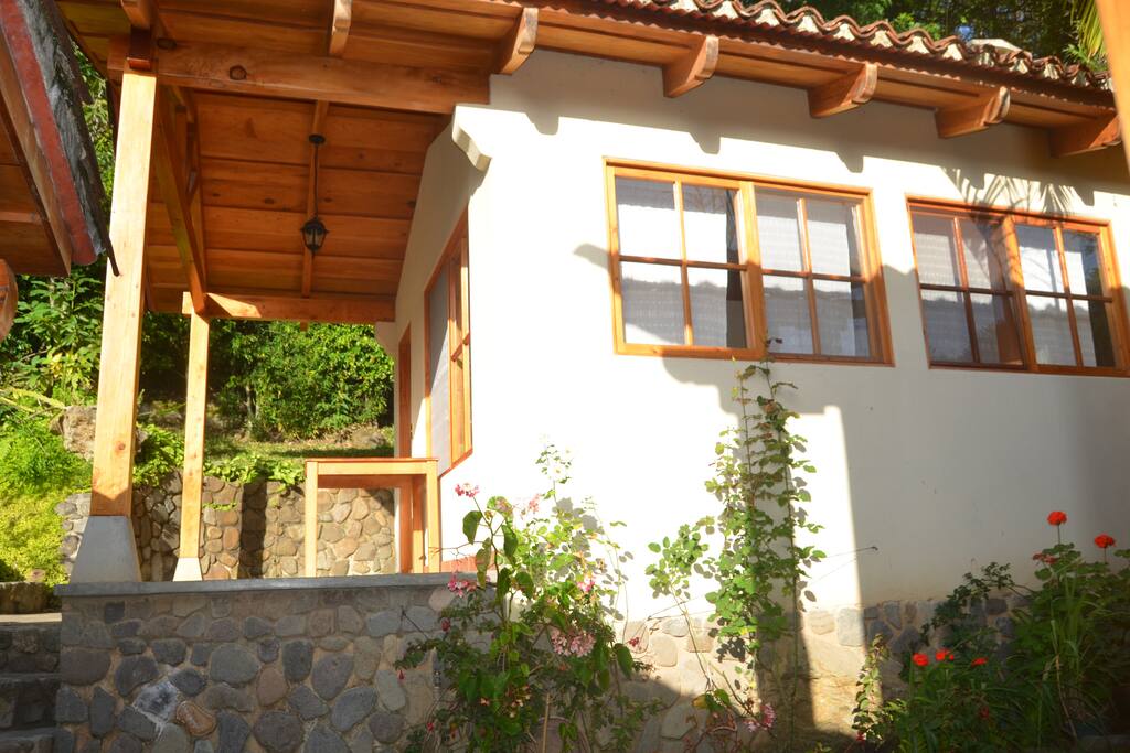 A side view of the bungalow as seen from the ground level