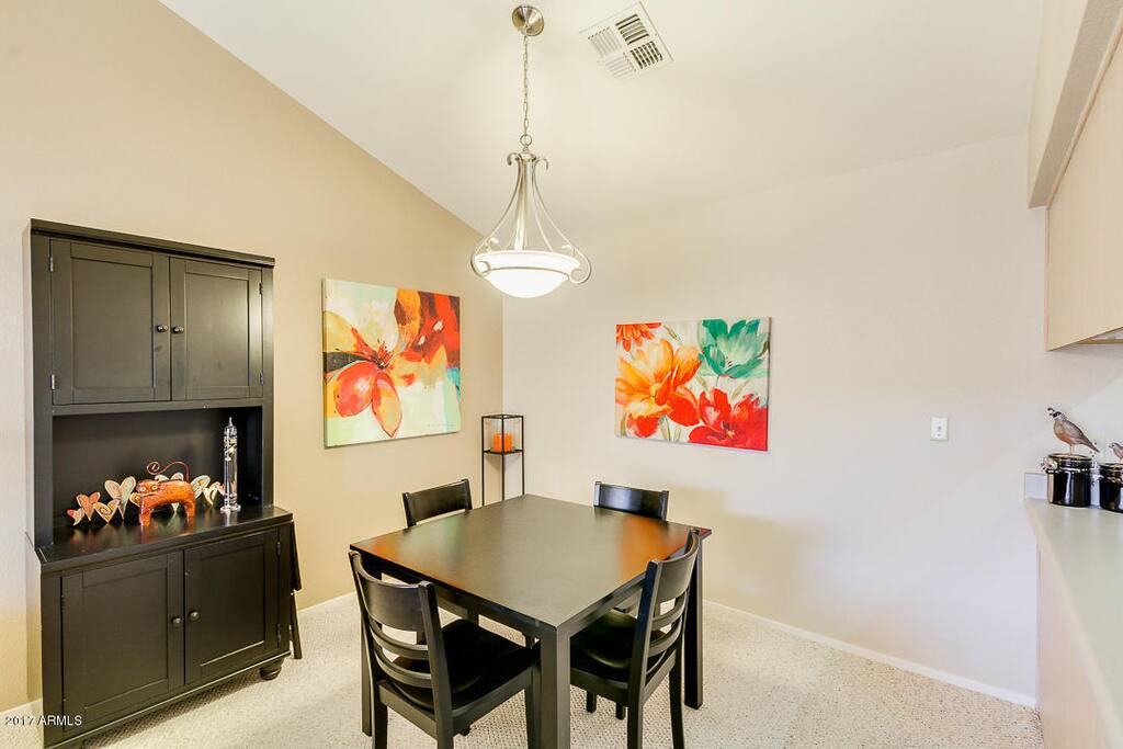 Spacious dining space open to living room & kitchen