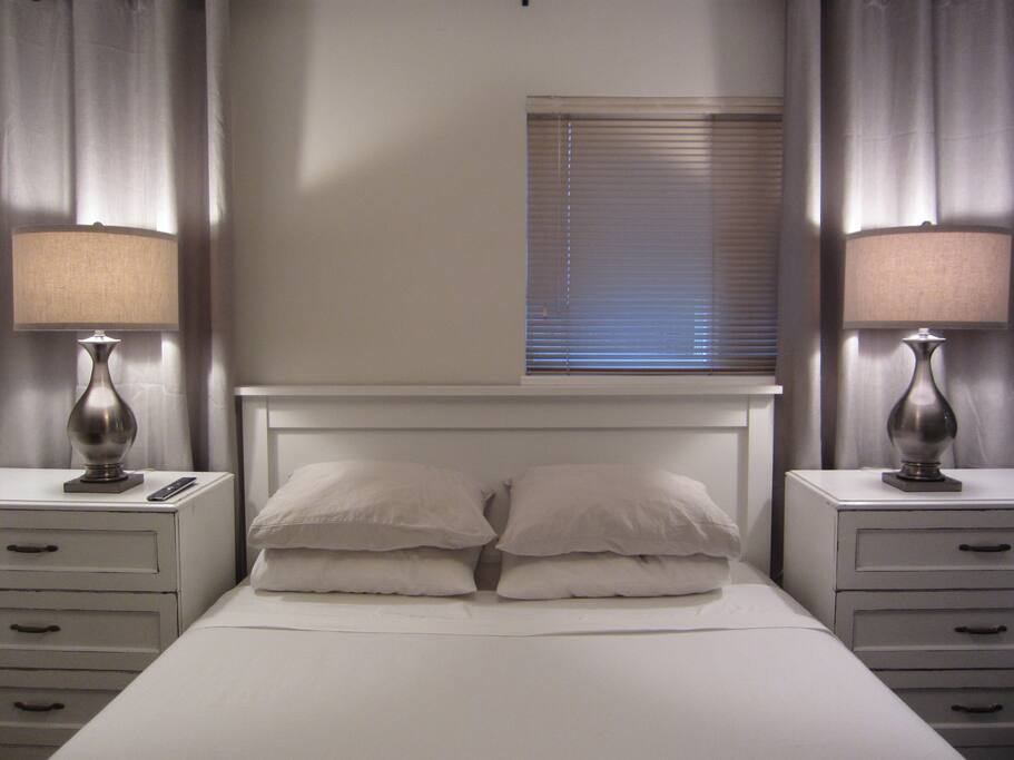 Clean and comfortable queen size bed, and dressers with lots of storage space.