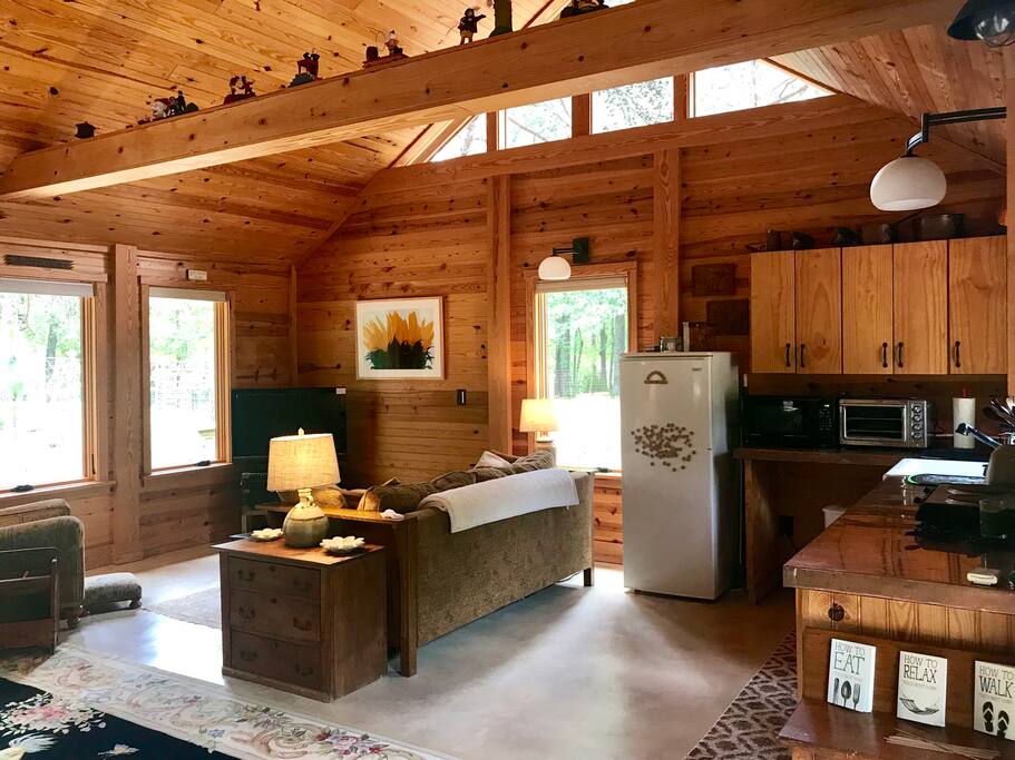 The front door has a stone walk which leads to the driveway and the old riding ring. The loft has a double thick mattress and box spring (on the floor).