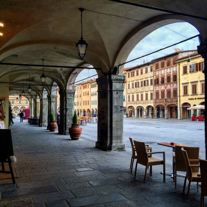 The beautiful Piazza of Figine hosts a market day every Tuesday morning. (Kind of reminds me of the piazza in the movie Malena of Monica Belluci). On regular days, there are the old men gathered in one bar chatting and playing cards and on several weekends a year- traditional medieval festivities.
It has 5 bars for every taste and age group, where you can have coffee in the sunlight, different restaurants and wine bars, groceries, fruit stands, wine bar, pizza parlor, a typical Italian barber shop, the neighborhood tabacchi (an Italian version of 7-11 but not quite).
The singer Sting has a vineyard in one of our hills (we are in the Chianti region- Italy's famous wine region and we sometimes see him in the piazza (locals just leave him alone) and sightings of Madonna and Dustin Hoffman (also left alone).
Figline is 25 minutes away by train from Florence, 15 minutes by bus from The Mall (Gucci and branded discount centers). Unlike Florence which only has tourists, Figline has both locals and tourists co-mingling peacefully.
