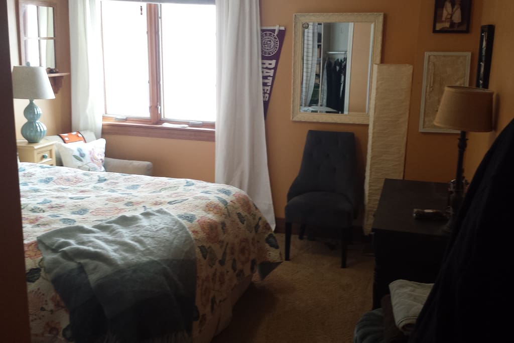 Queen bed, small but adequate room. North-facing window