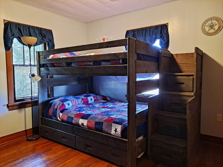Bedroom 2. The Texaco Room with full-size over full-size bunk beds and twin-size trundle. (The trundle is suitable for a child.)