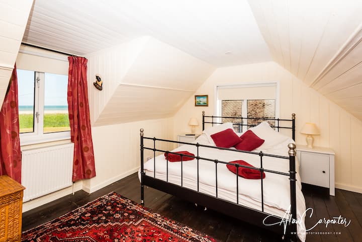 Top floor double bedroom with sea views.