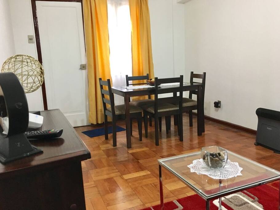 living room area with table and chairs