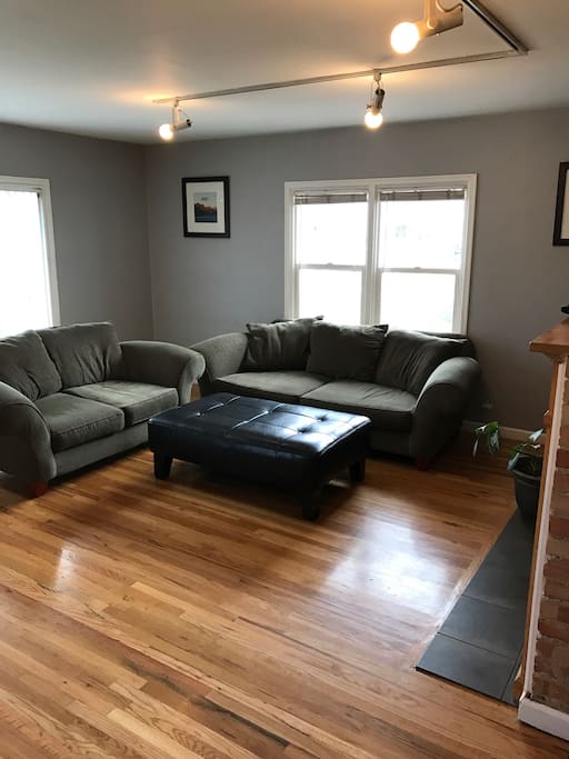 Plenty of natural light from large windows, and beautiful hardwood floors.