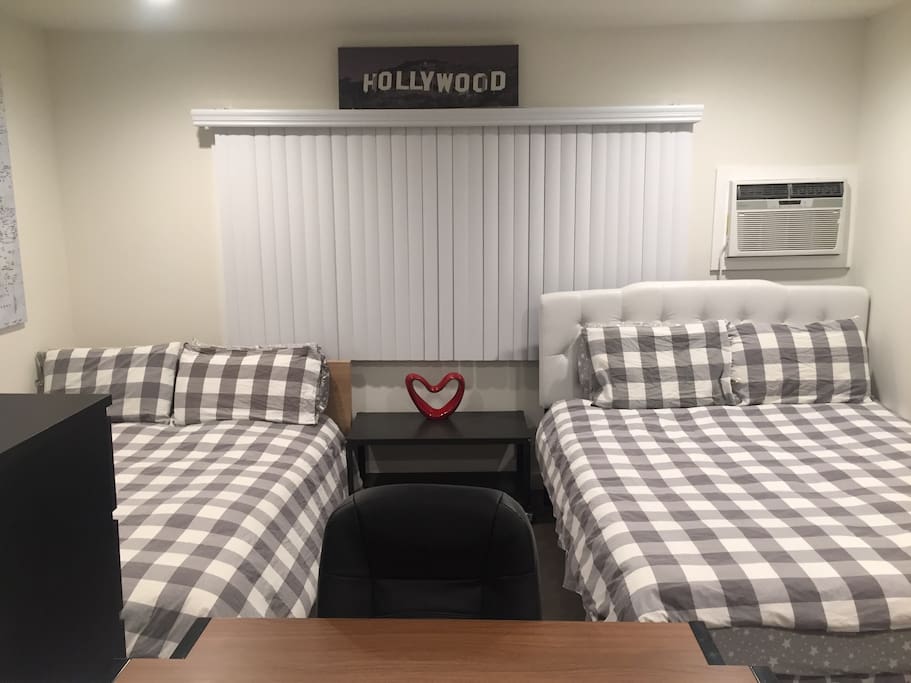 Two beds and a desk