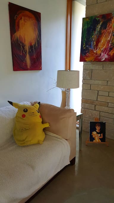 Artist and Pickachoo in living room