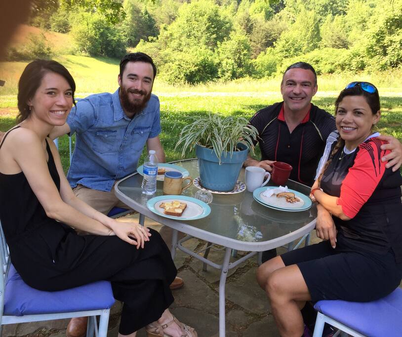Our guests enjoying the patio on a beautiful morning at the farmhouse.