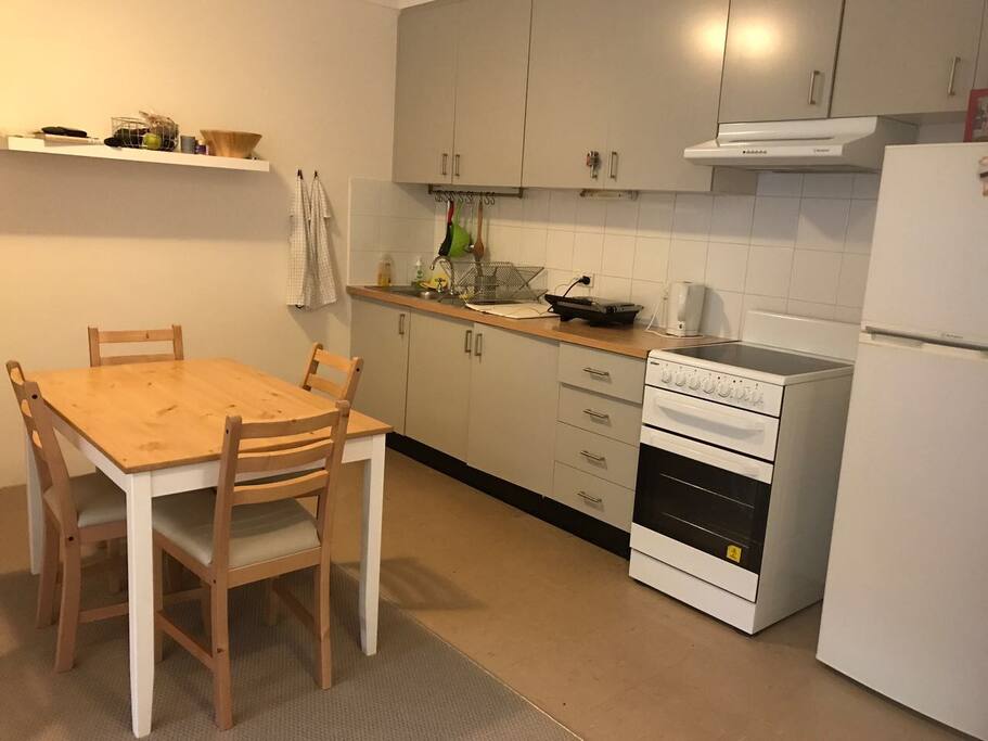 Fully equipped kitchen with oven, refrigerator, sandwich grill and every kitchen tool that may be needed.