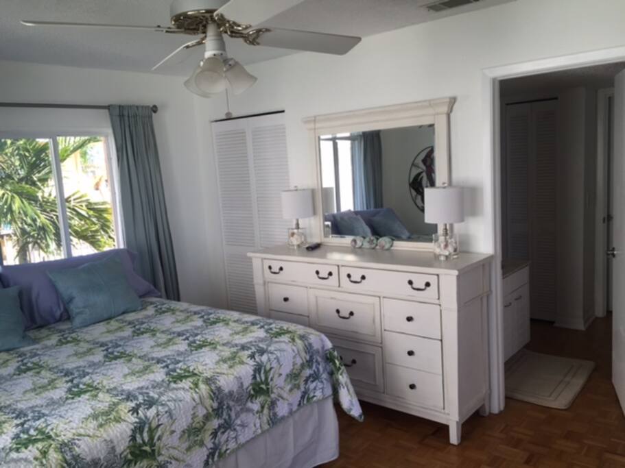 Master bedroom has sliding door out to deck