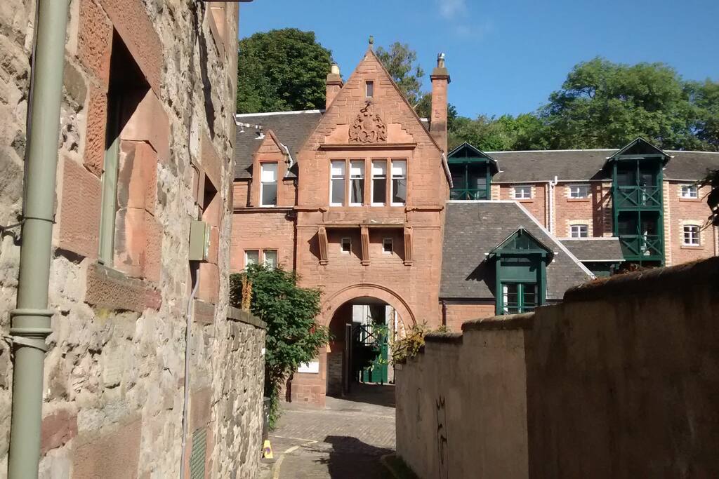 Arched entrance gate to apartment in converted brewery