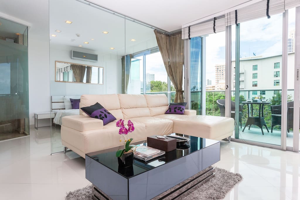 Couch with purple pillows