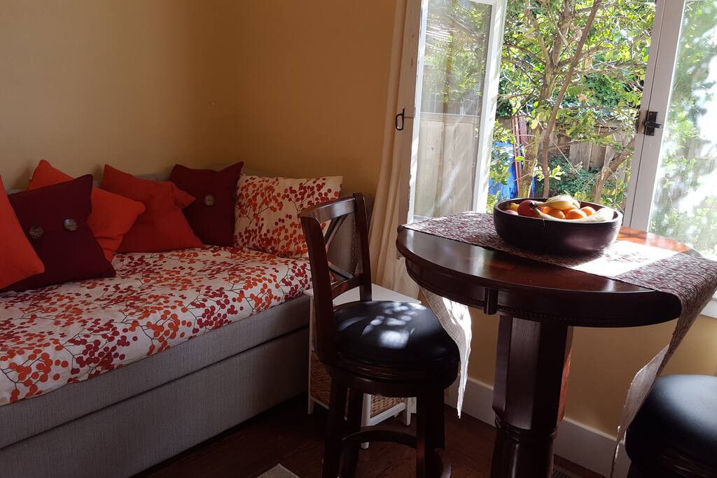 Swivel on your bar stool at the pub table and enjoy the garden view