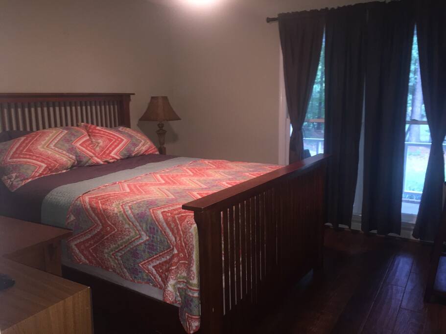 Queen size bed with memory topper