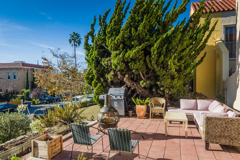 Outdoor couches, firepit, BBQ, great sunsets and a small sliver of ocean view