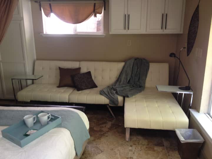 Step inside the cottage and begin right (counter clockwise) to take the virtual tour to the Sitting Area with Sofa and side tables