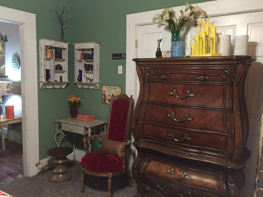 Dresser and desk in bedroom