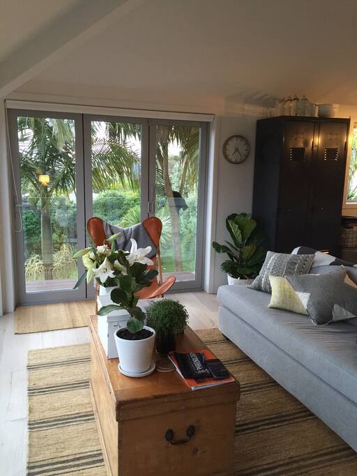 Second living room - next to kitchen and doors to outdoor deck