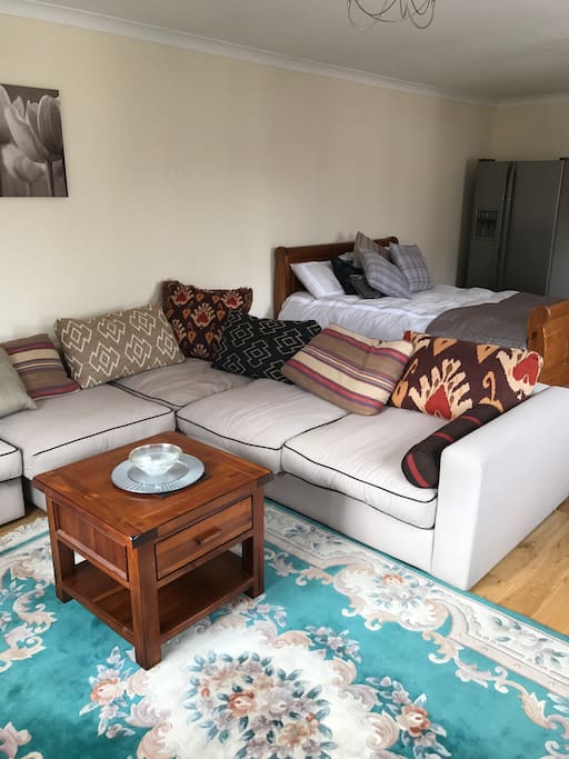 Spacious living area with corner couch