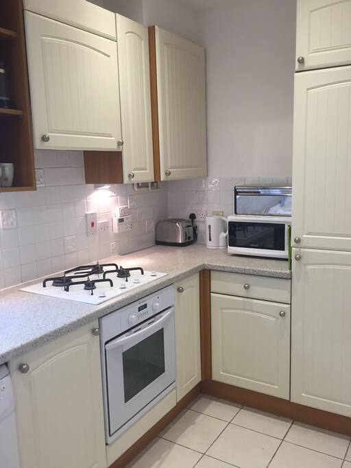 kitchen with dishwasher and washer/dryer