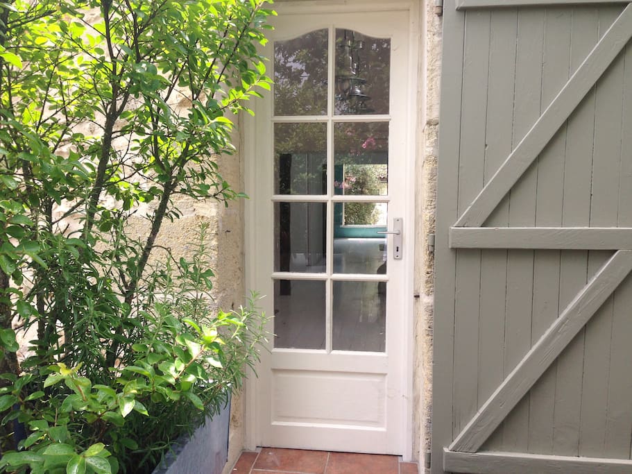 The front door leads into a light and spacious open-plan living area