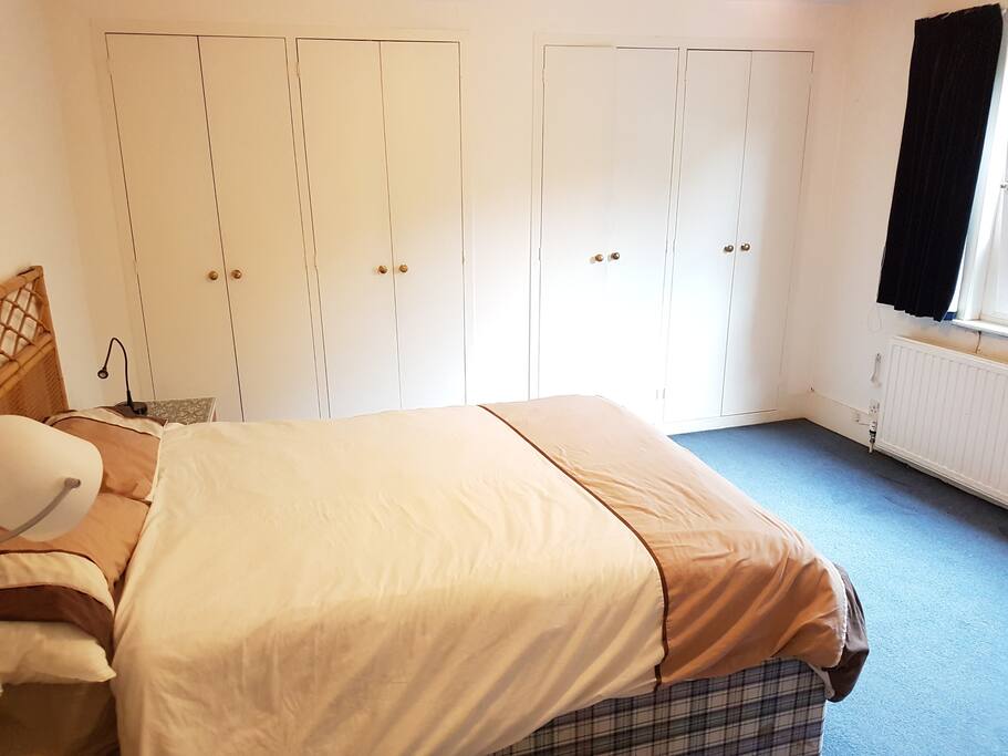 large first bedroom and wardrobes