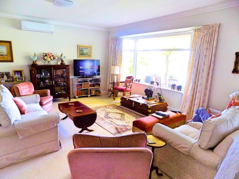 Open plan living room with Large flat Tv