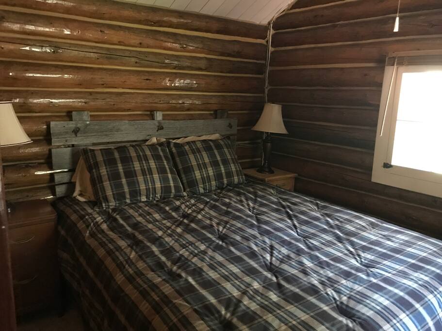 One bedroom with a queen bed