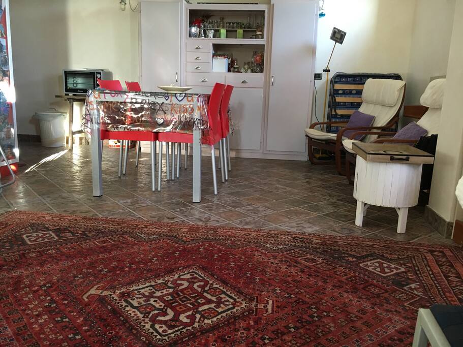 The table and the big carpet