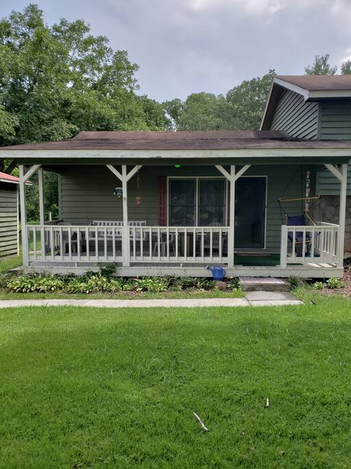 The front porch and swing to sit in and watch the world go by.