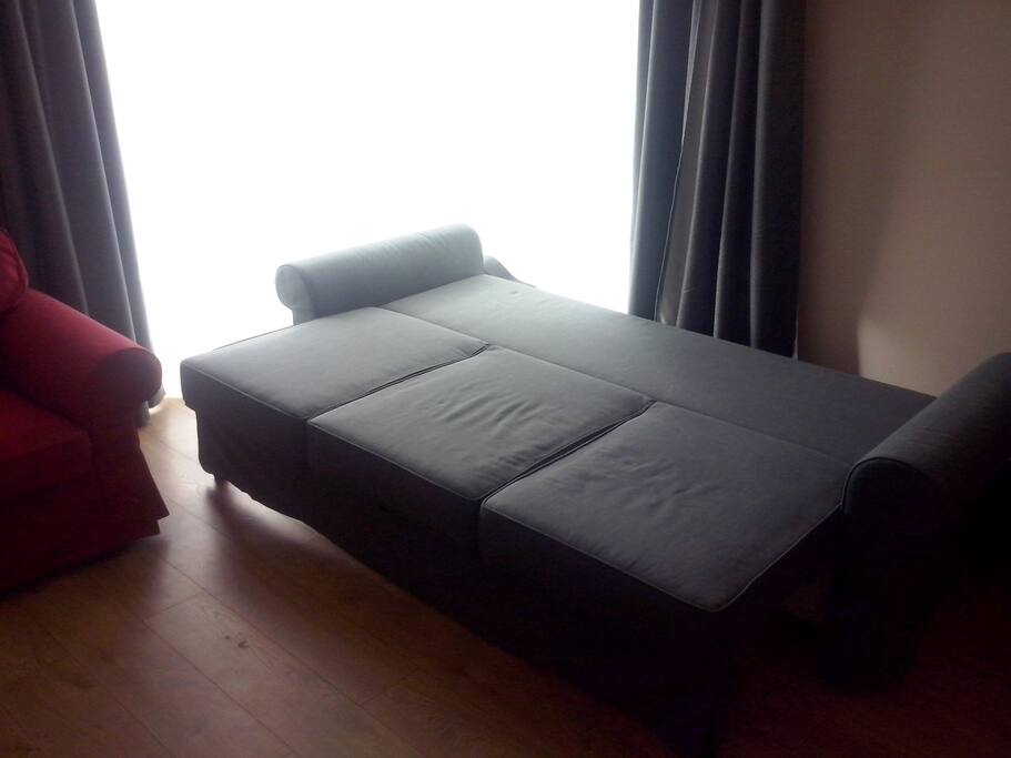 One-hand IKEA sofa easily changing into comfortable marital bed