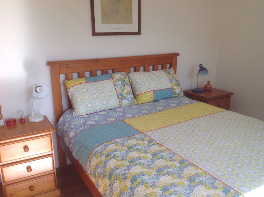 This will be your your room. You can expect crisp, clean sheets, a bedside table with lamp, balcony and spectacular mountain views.