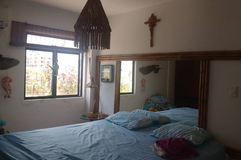 Quarto com ar condicionado