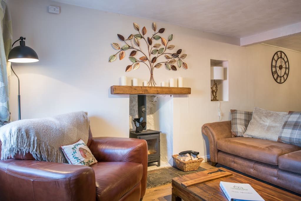 Cosy living room with wood burning fireplace