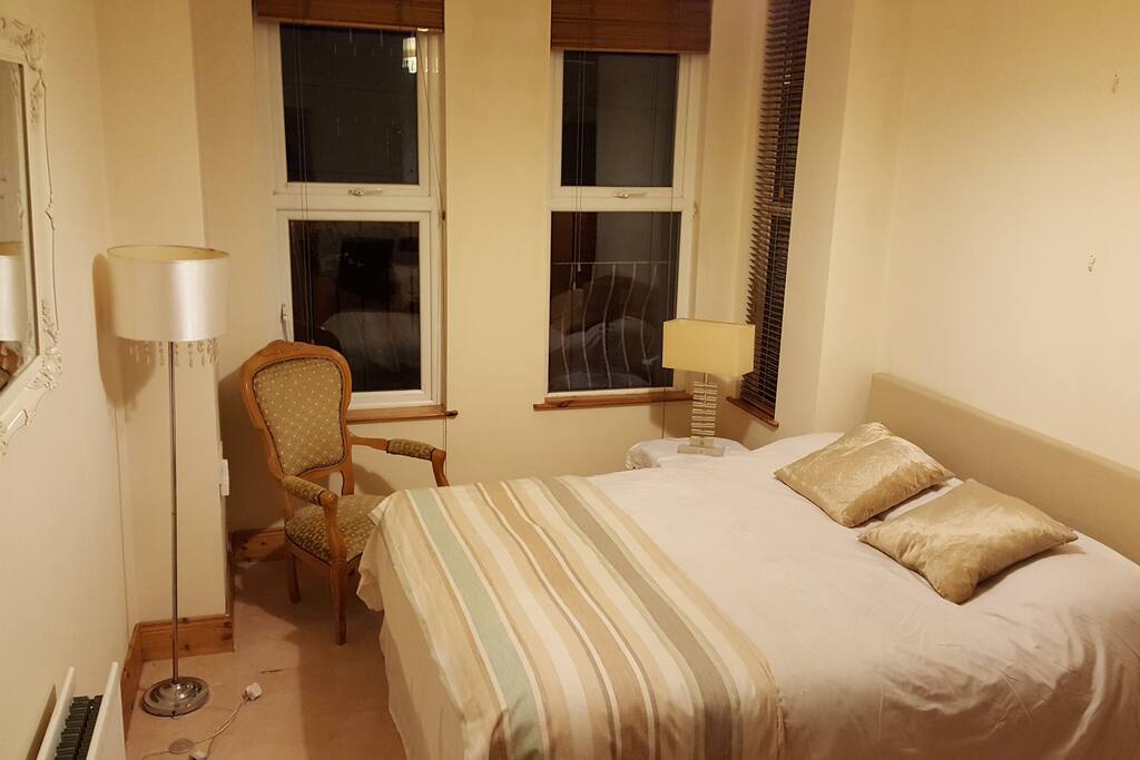 Large bedroom with lovely bay window, double bed and good wardrobe and drawer space