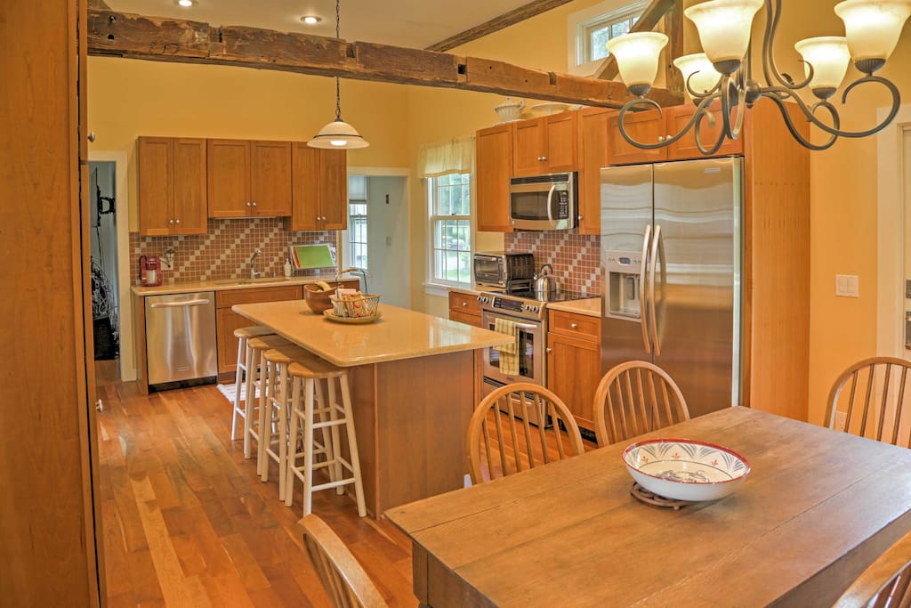 Hardwood floors meet your feet in the kitchen and living area.