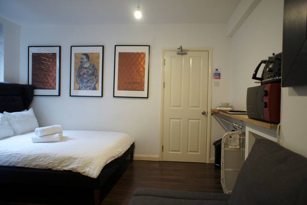 Here's your studio with double sofa-bed