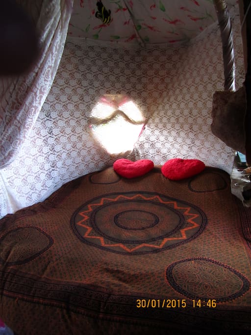 inside cosy romantic guest bed