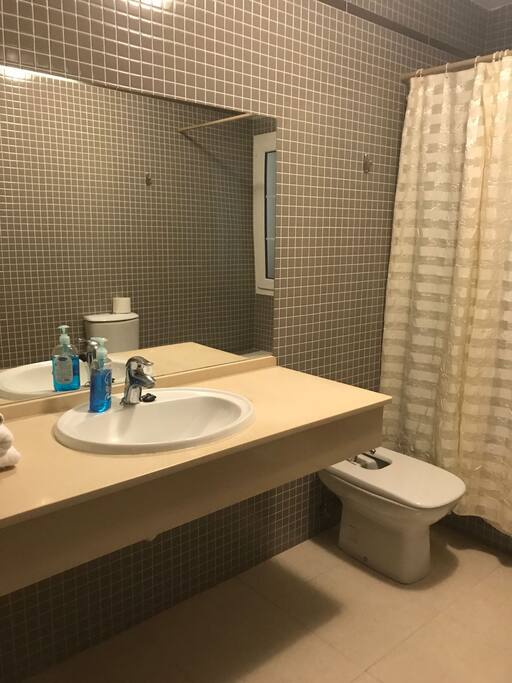 BAÑO IN SUIT