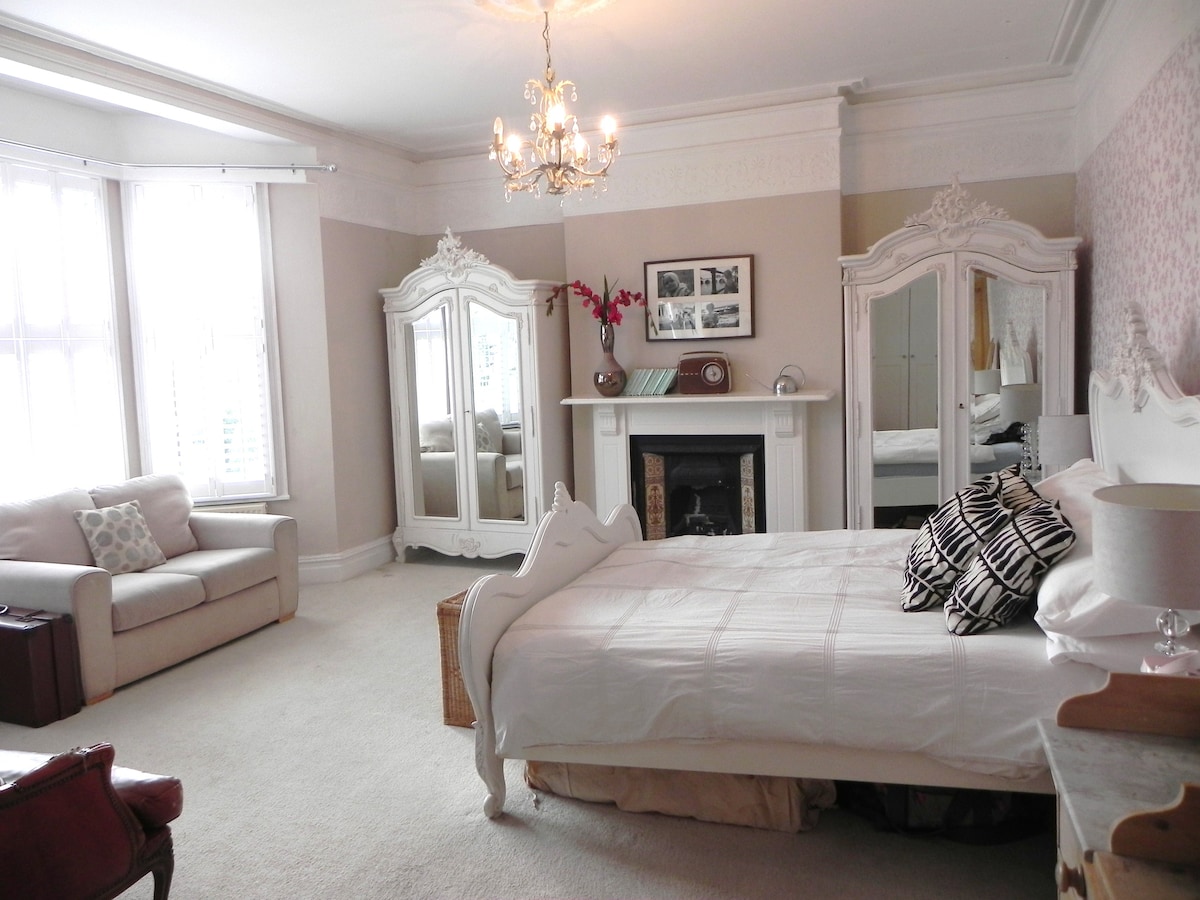 Hard to leave this bedroom which has an en suite and beautiful French shabby chic furniture throughout with an ornately carved bed and two beautiful armoires. 