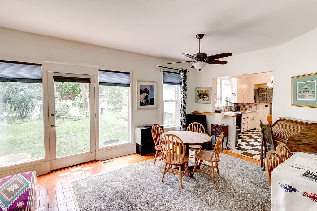 Dining Room With Kitchen in Background