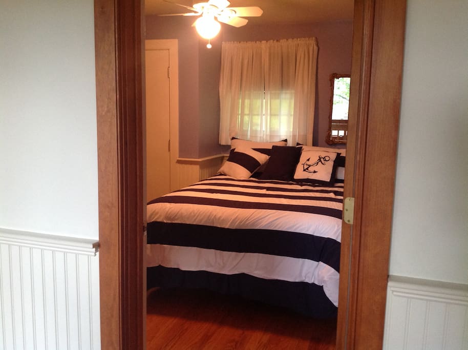 Guest room, queen bed and private bath.
