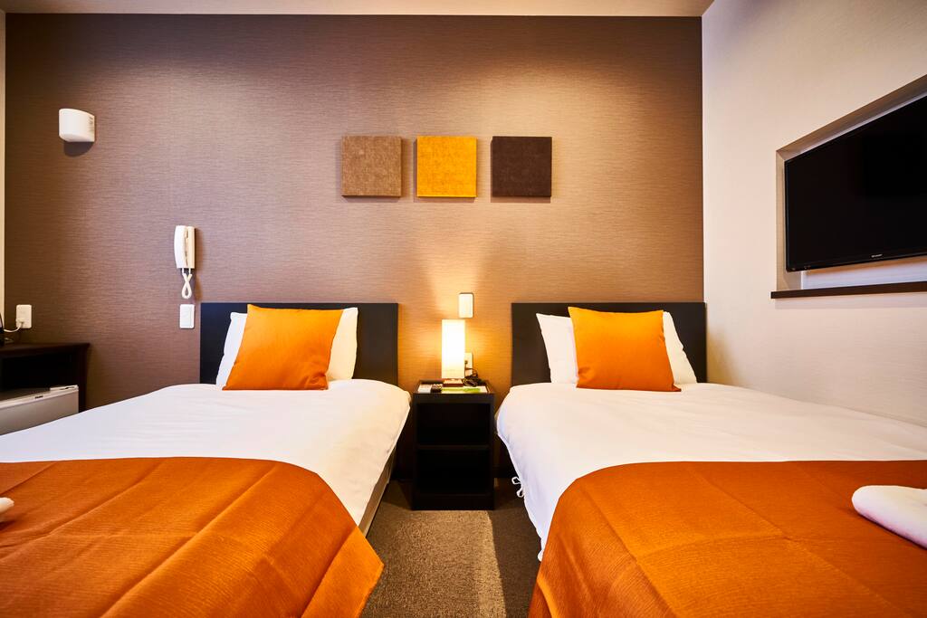 Western bedroom with comfortable beds.