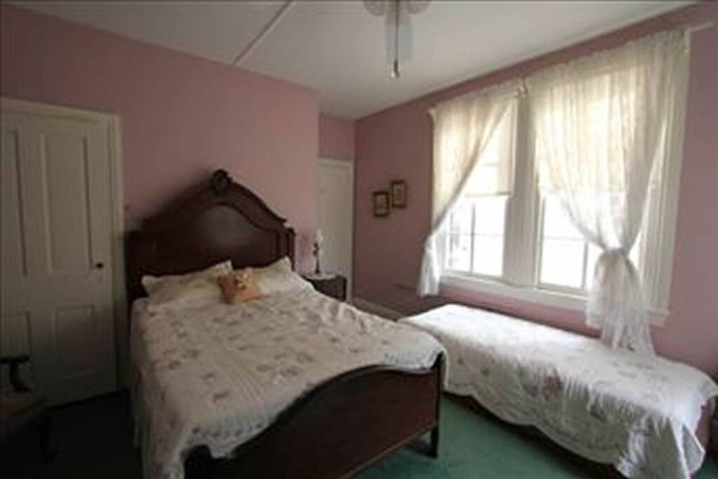 Double bed with single day bed