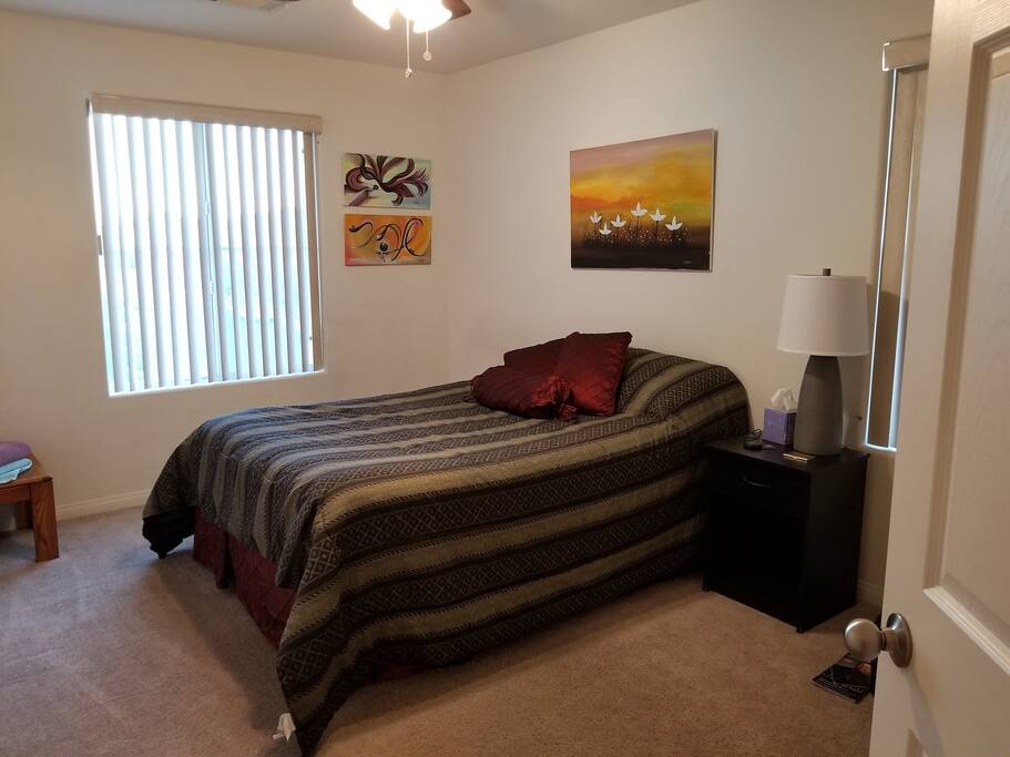 Private bedroom with closet and storage space.